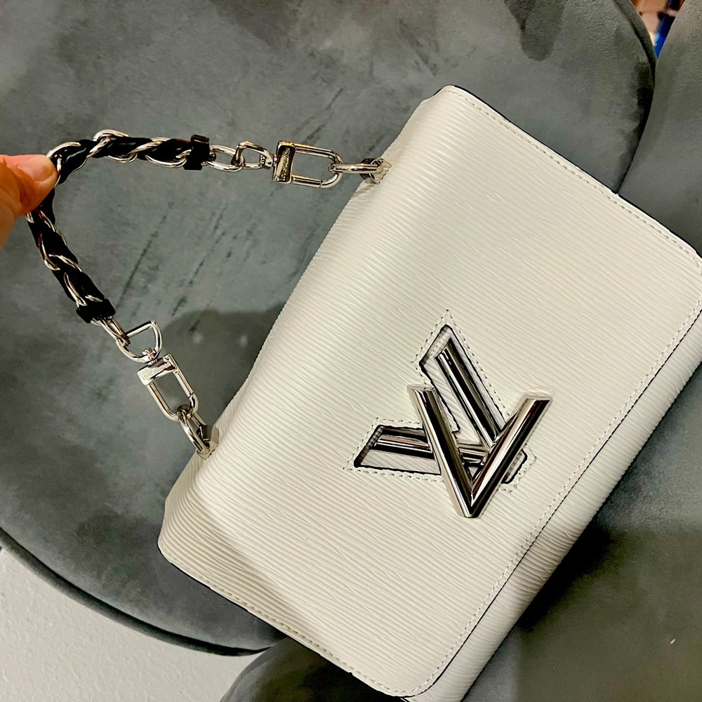 Stylish and elegant white handbag.